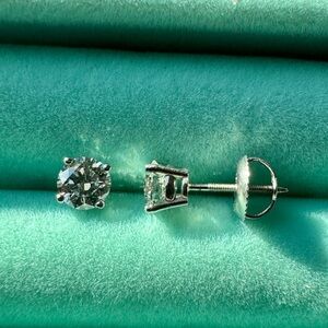 1 CTW Lab Diamond Stud Earring. (.50ct each)